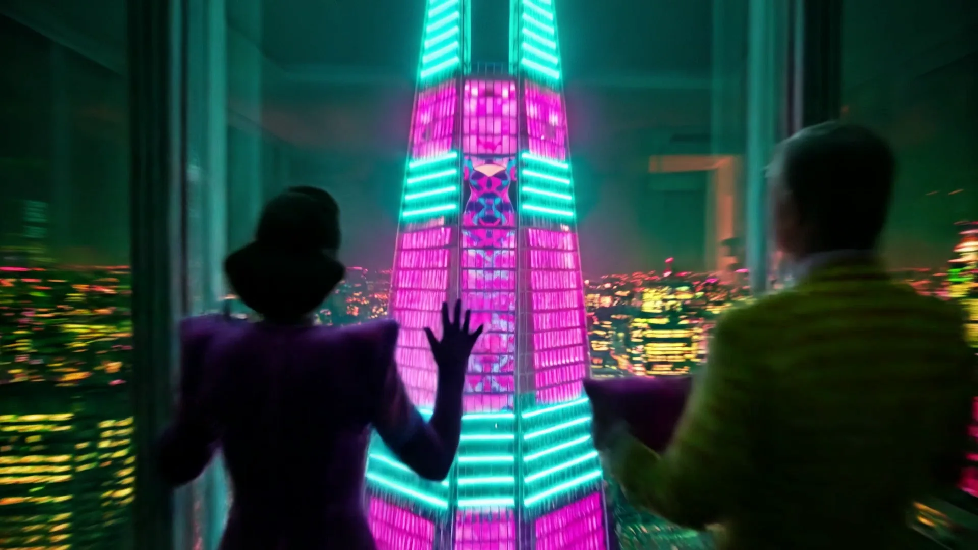 Anna and the Boss at the window as the Shard burns magenta harlequin